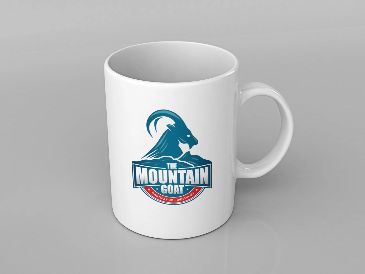 The Mountain Goat logo on a coffee mug