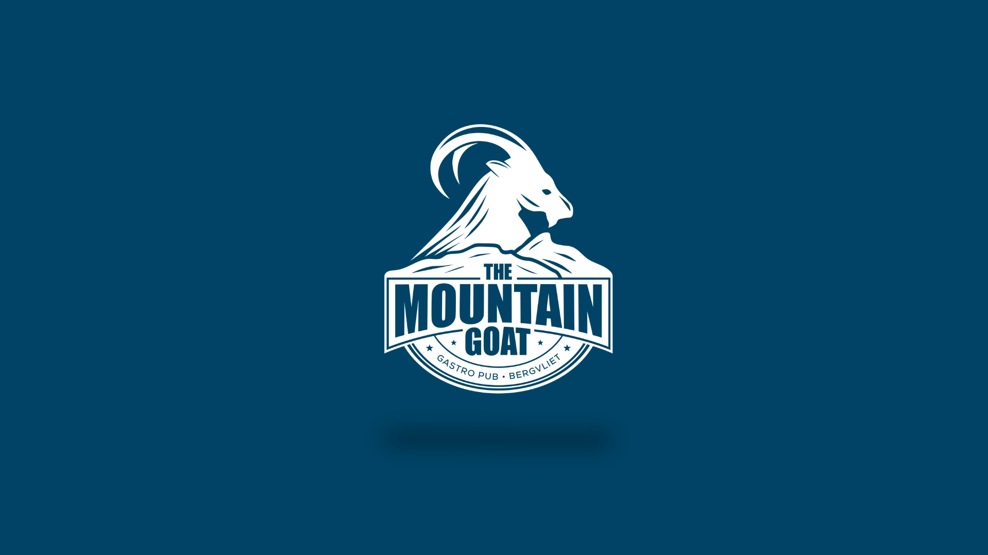 The Mountain Goat logo preview on blue background