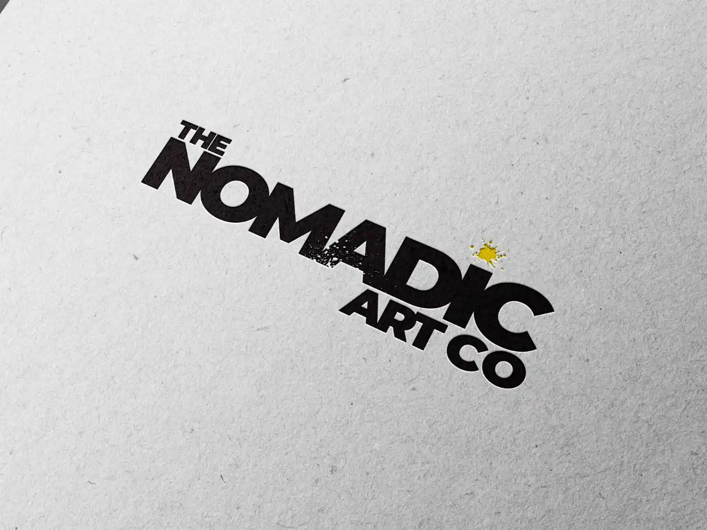The Nomadic Art Co logo on textured paper