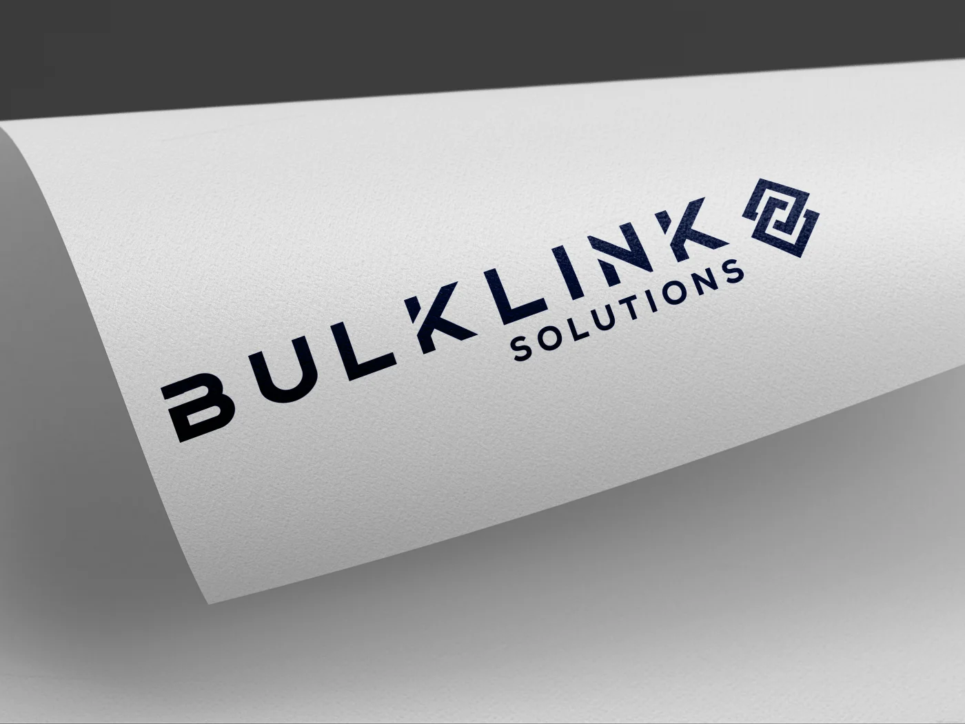Logo presentation for Bulklink solutions on a rolled piece of white paper